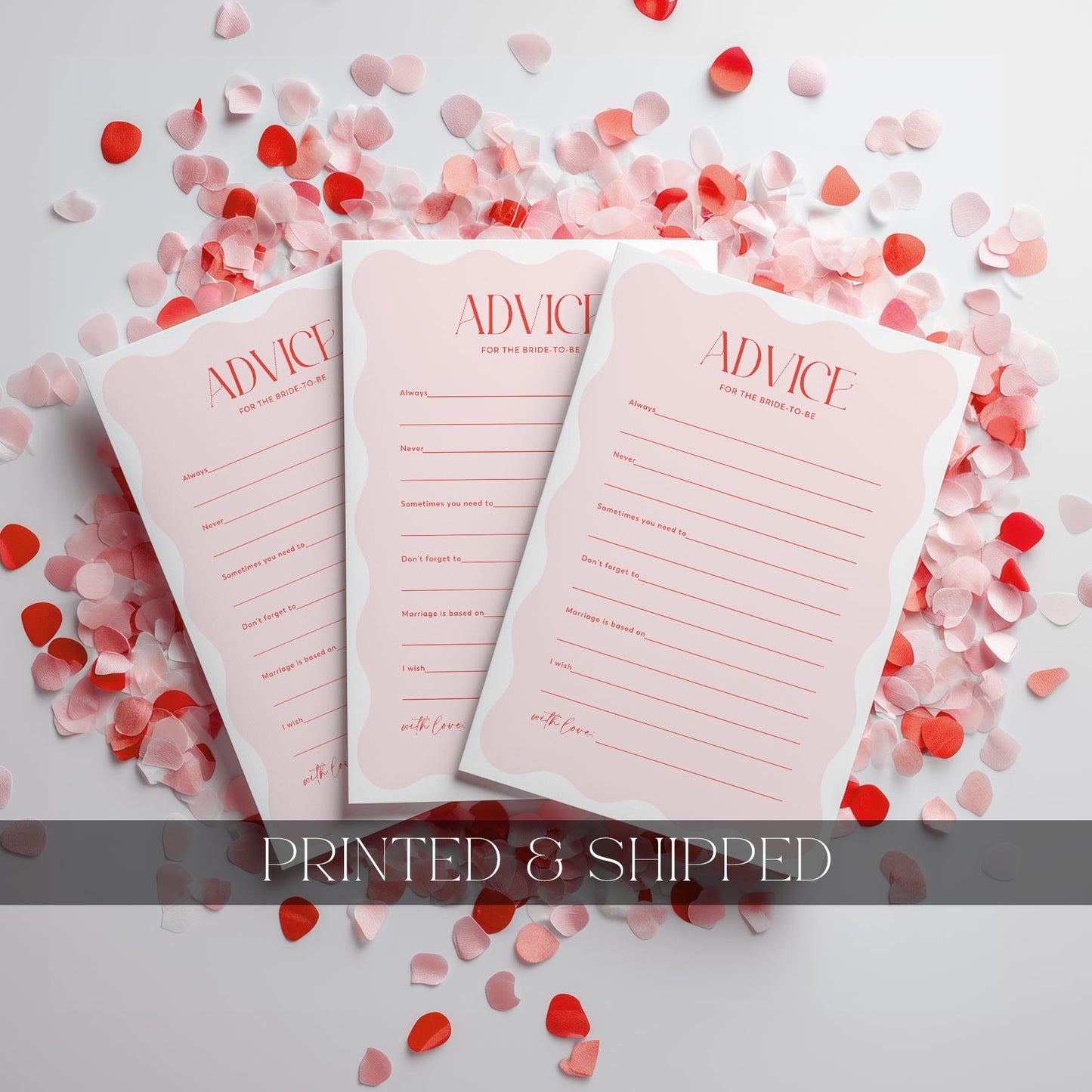 Three 'Advice' cards on a surface with heart-shaped confetti
