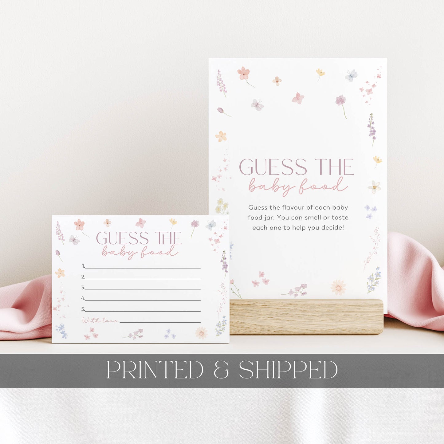 Floral baby shower game card for 'Guess the baby food' on a light background