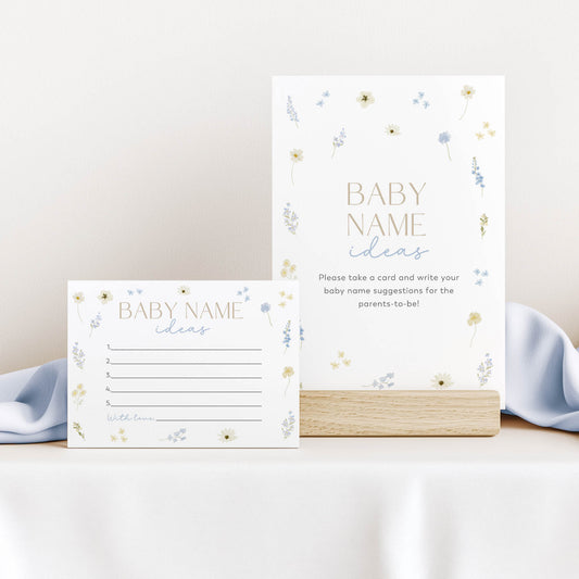 Two baby name suggestion cards with floral designs on a white surface.