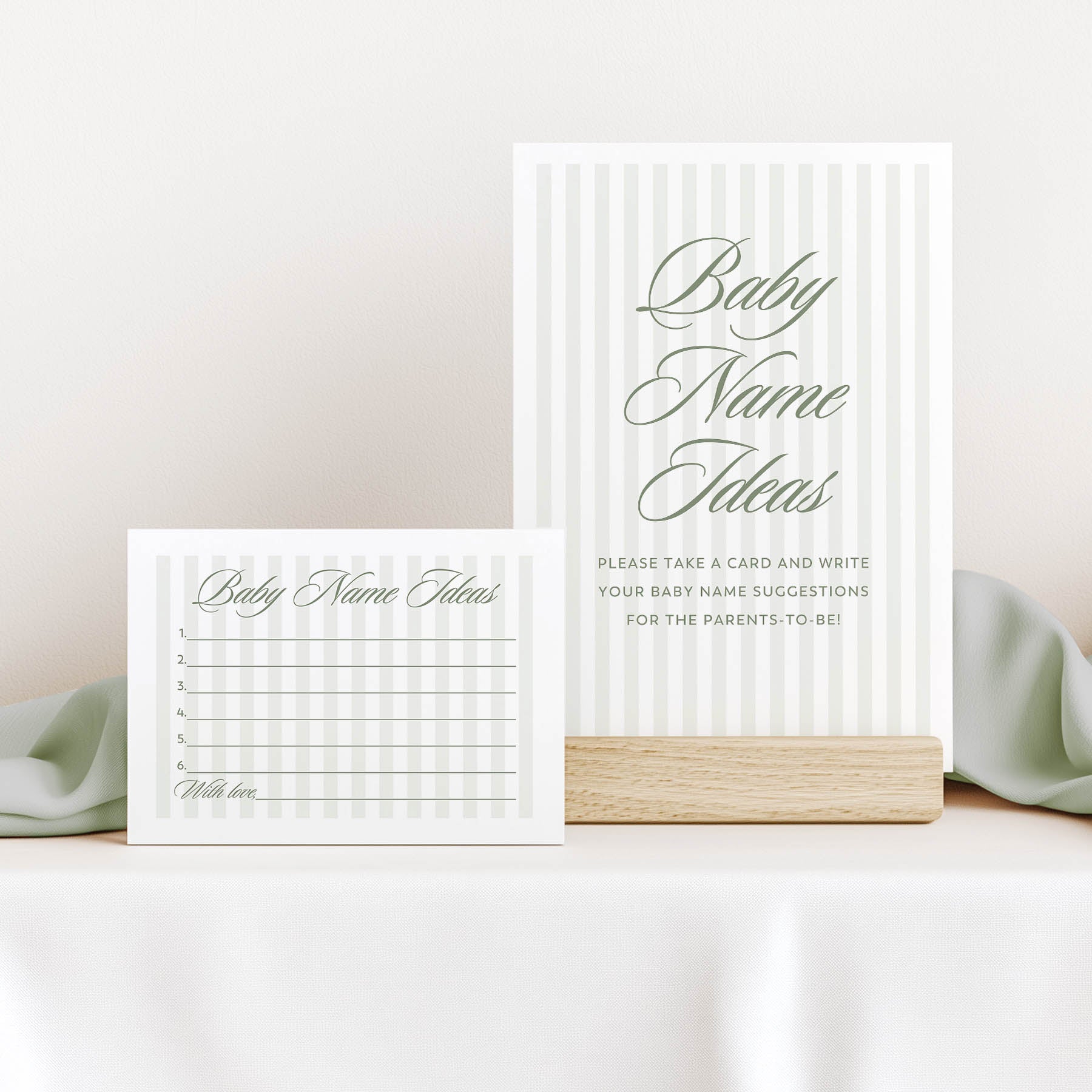 Baby name suggestion cards on a white surface with a light background