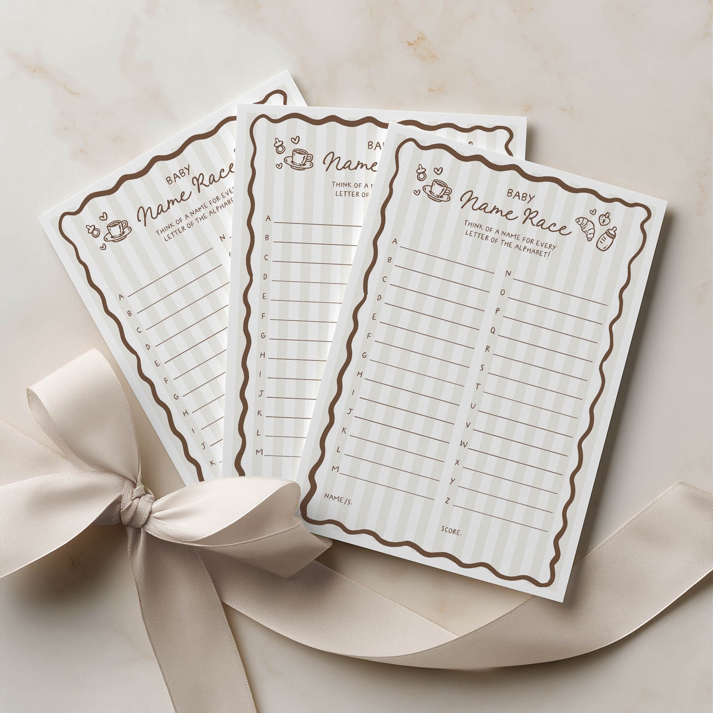 Three baby name race cards with decorative border on a beige background