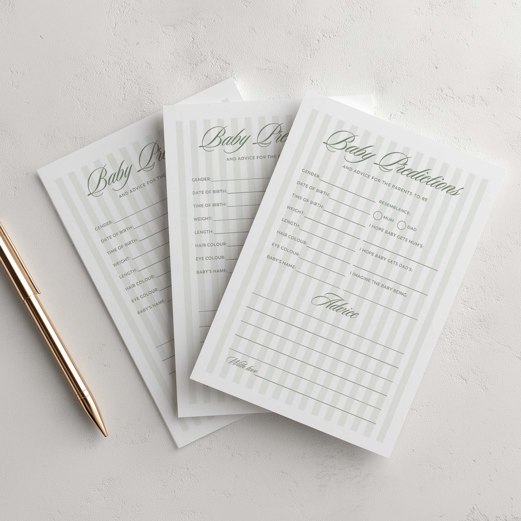 Three green stripe baby shower planning sheets on a light gray surface with a pen.