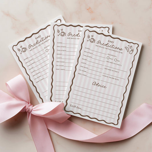 Three baby prediction and advice cards with decorative pink ribbon on a light background
