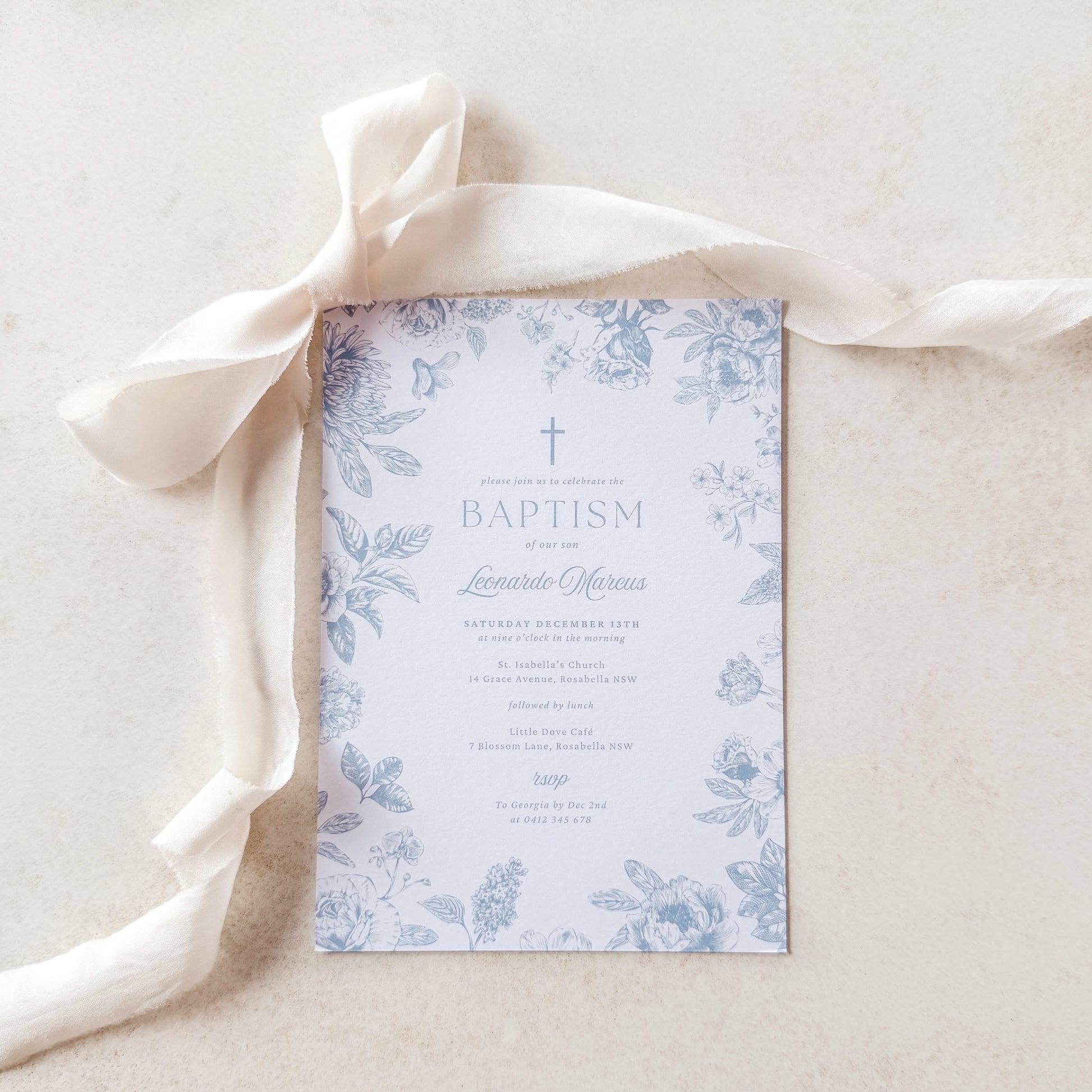 Baptism invitation with floral design on a light background