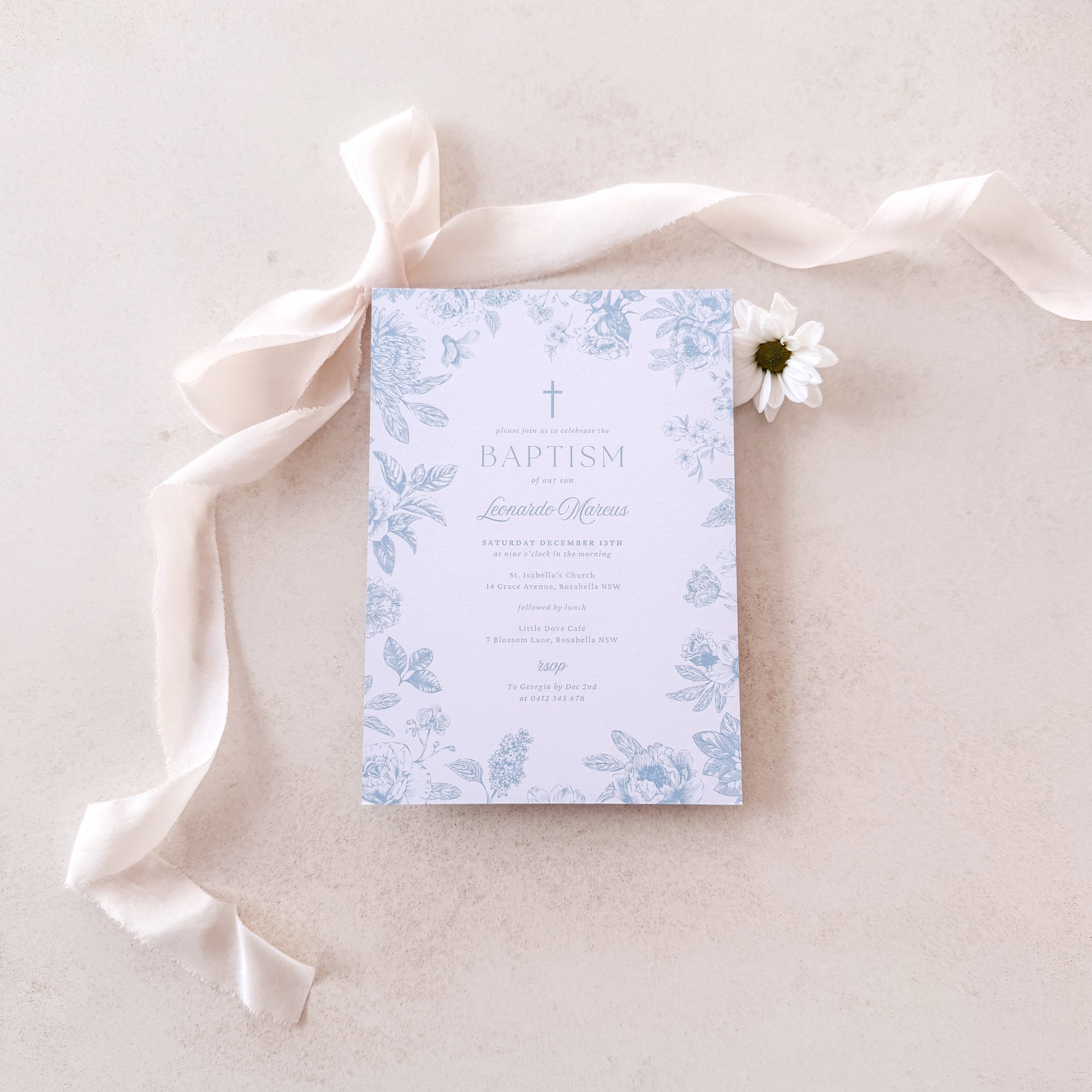 Baptism invitation with floral design on a light background