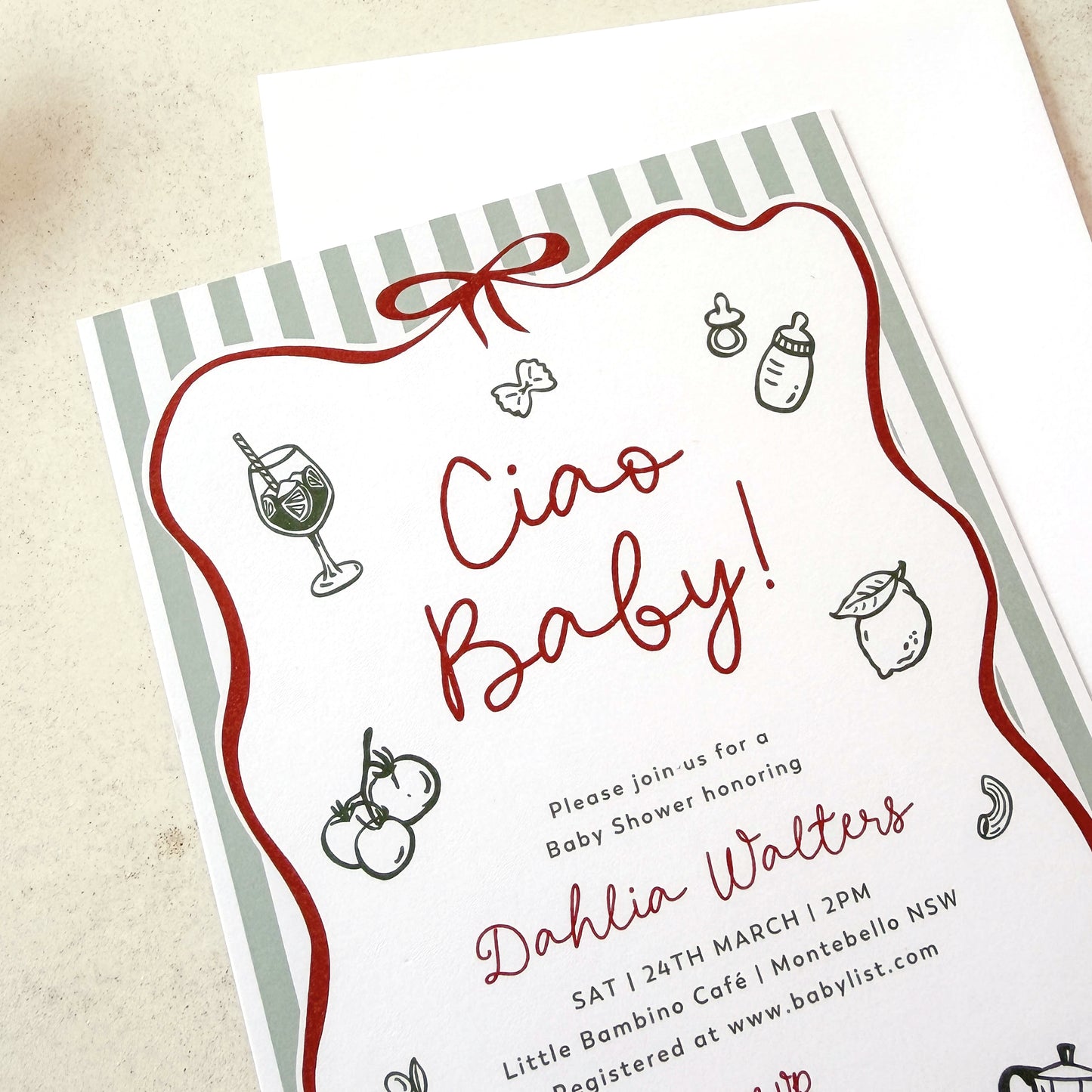 Baby shower invitation with 'Ciao Baby!' text and baby-related illustrations on a striped background.