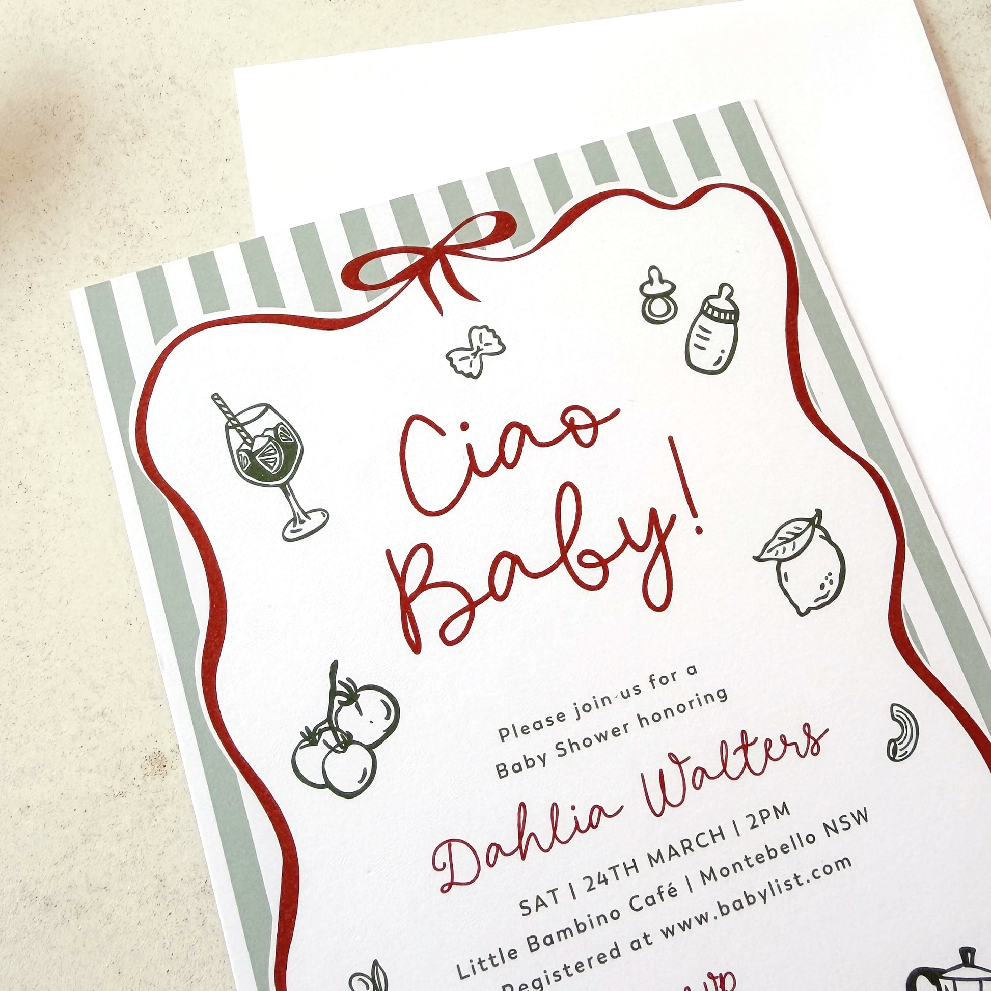 Baby shower invitation with 'Ciao Baby!' text and baby-related illustrations on a striped background.