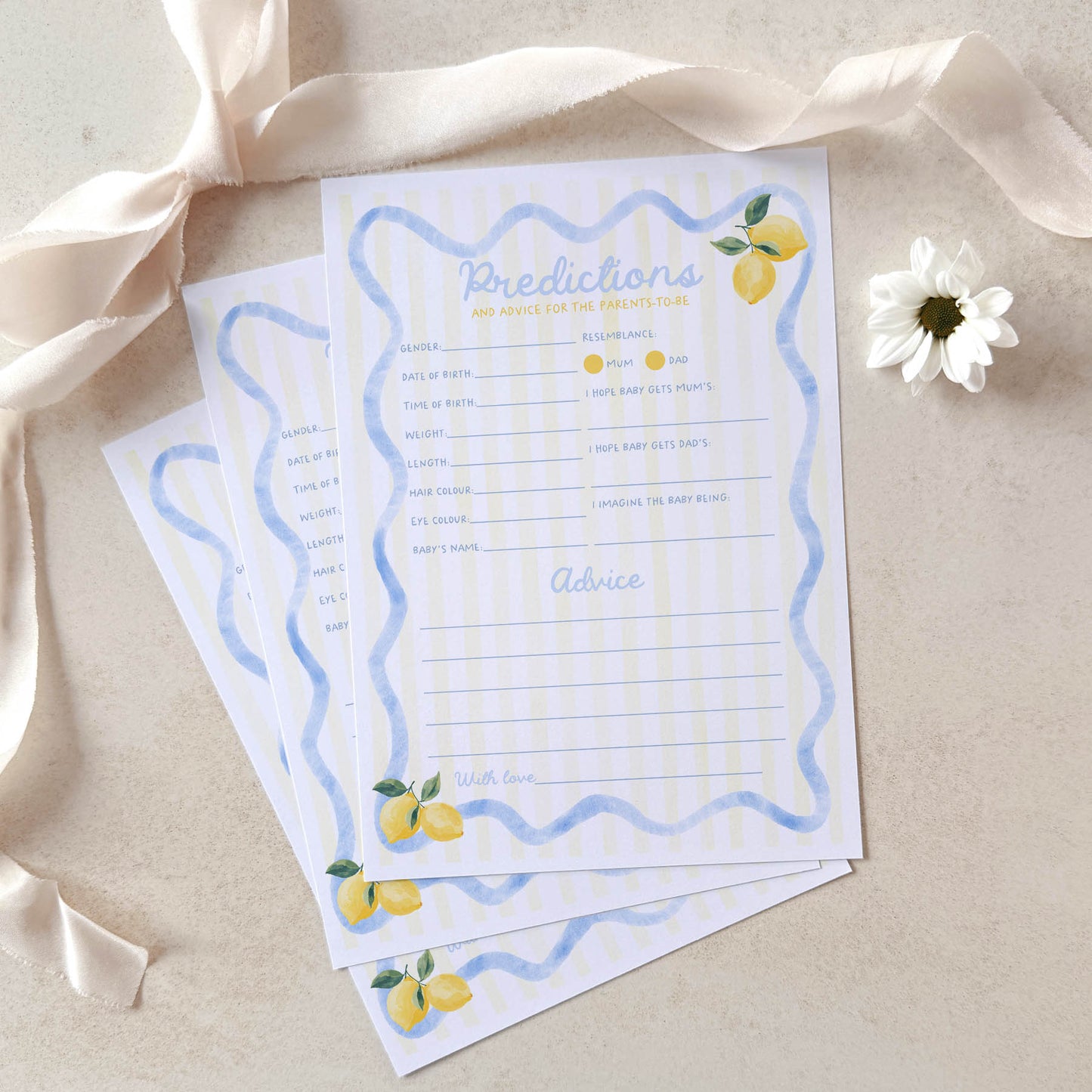 Two baby shower prediction and advice cards with lemon illustrations on a beige background.