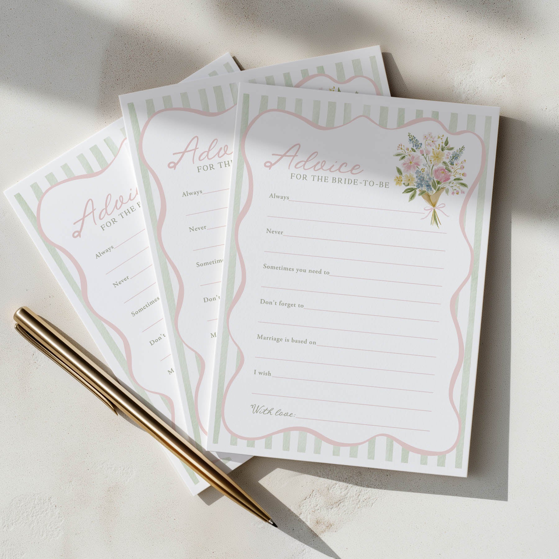 Two sheets of 'Advice for the Bride to Be' cards with a pen on a light surface