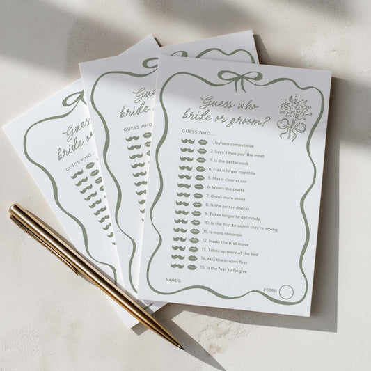 Three sheets of paper with bridal shower games on a light surface.