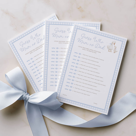 Three baby shower games with a blue ribbon on a light background