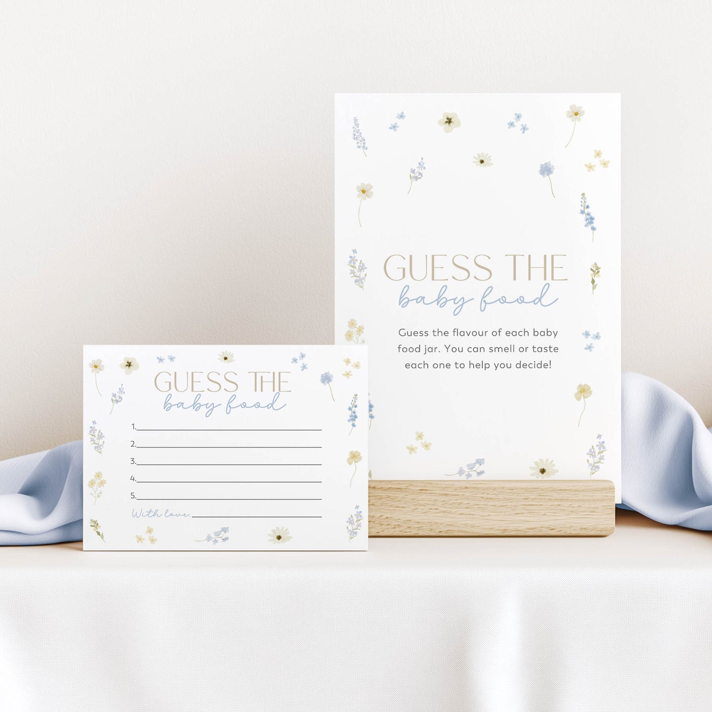 Guess the baby food game cards with floral design on a white background