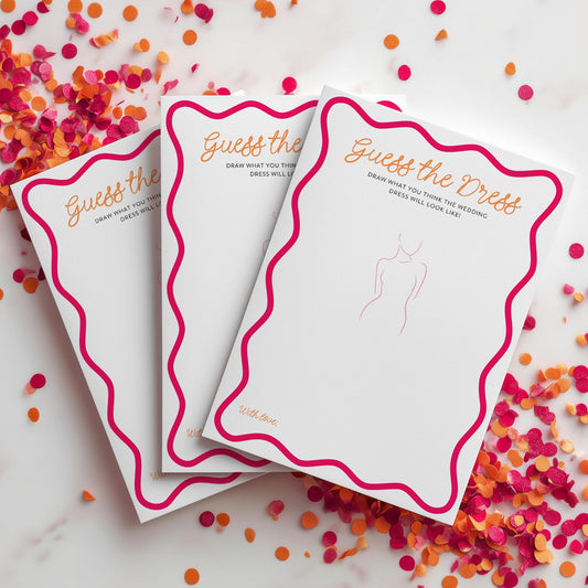 Three 'Guess the Dress' cards on a surface with confetti around them.