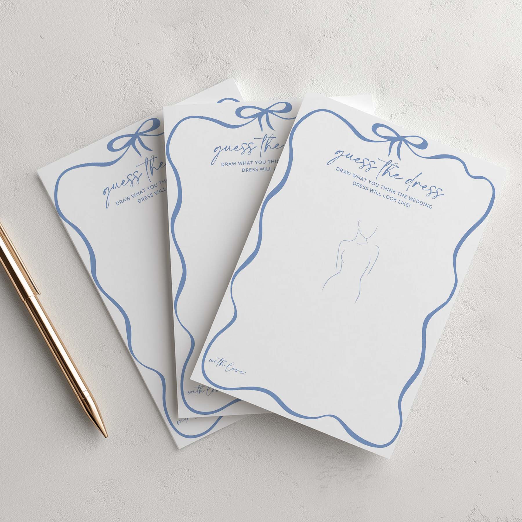Three 'Guess the Dress' cards with blue ribbons on a light gray background
