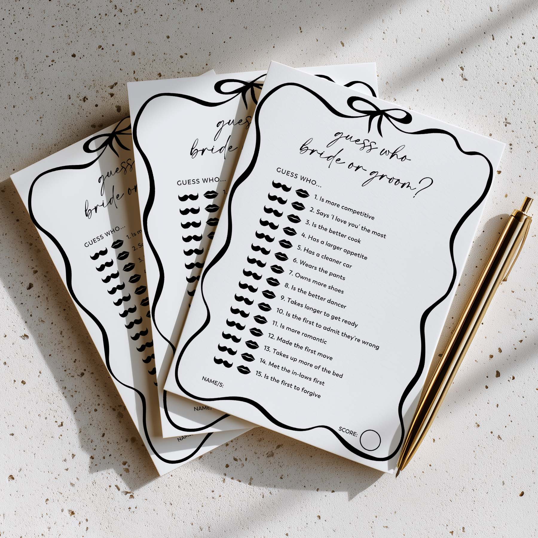 Guess who bride or groom game cards with a pen on a textured surface