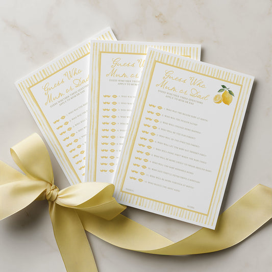 Three white cards with gold text and a yellow ribbon on a light background