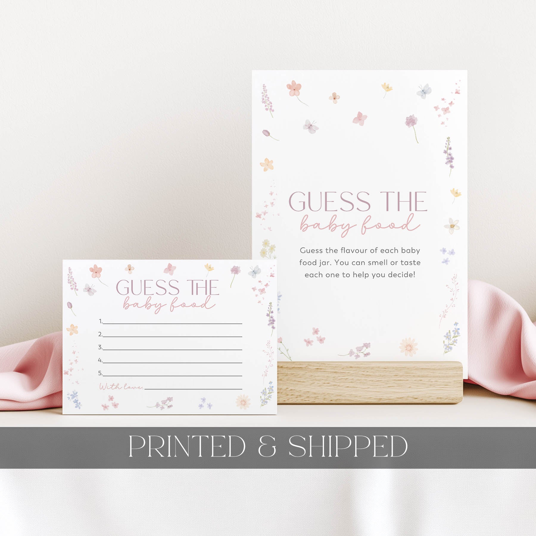 Floral baby shower game card for 'Guess the baby food' on a light background