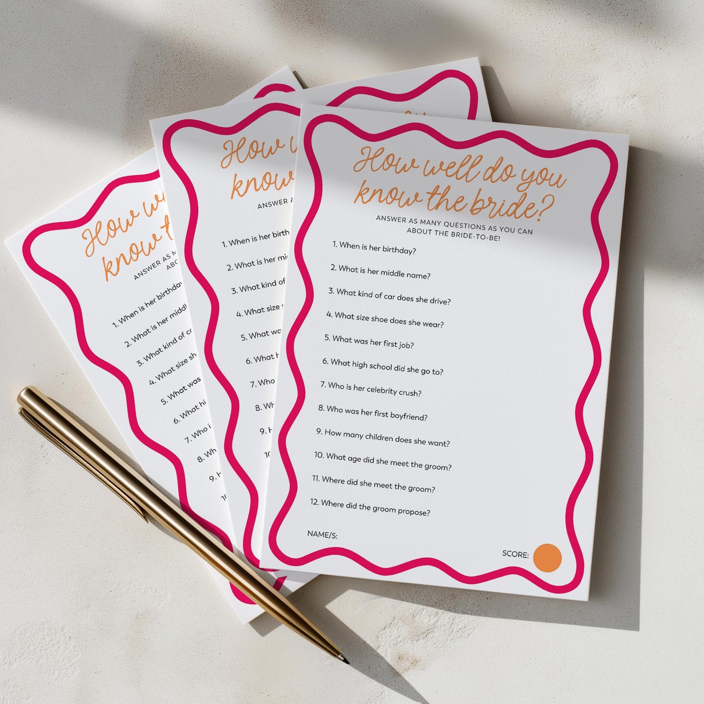 Two questionnaires titled 'How well do you know the bride?' on a light surface with a pen.