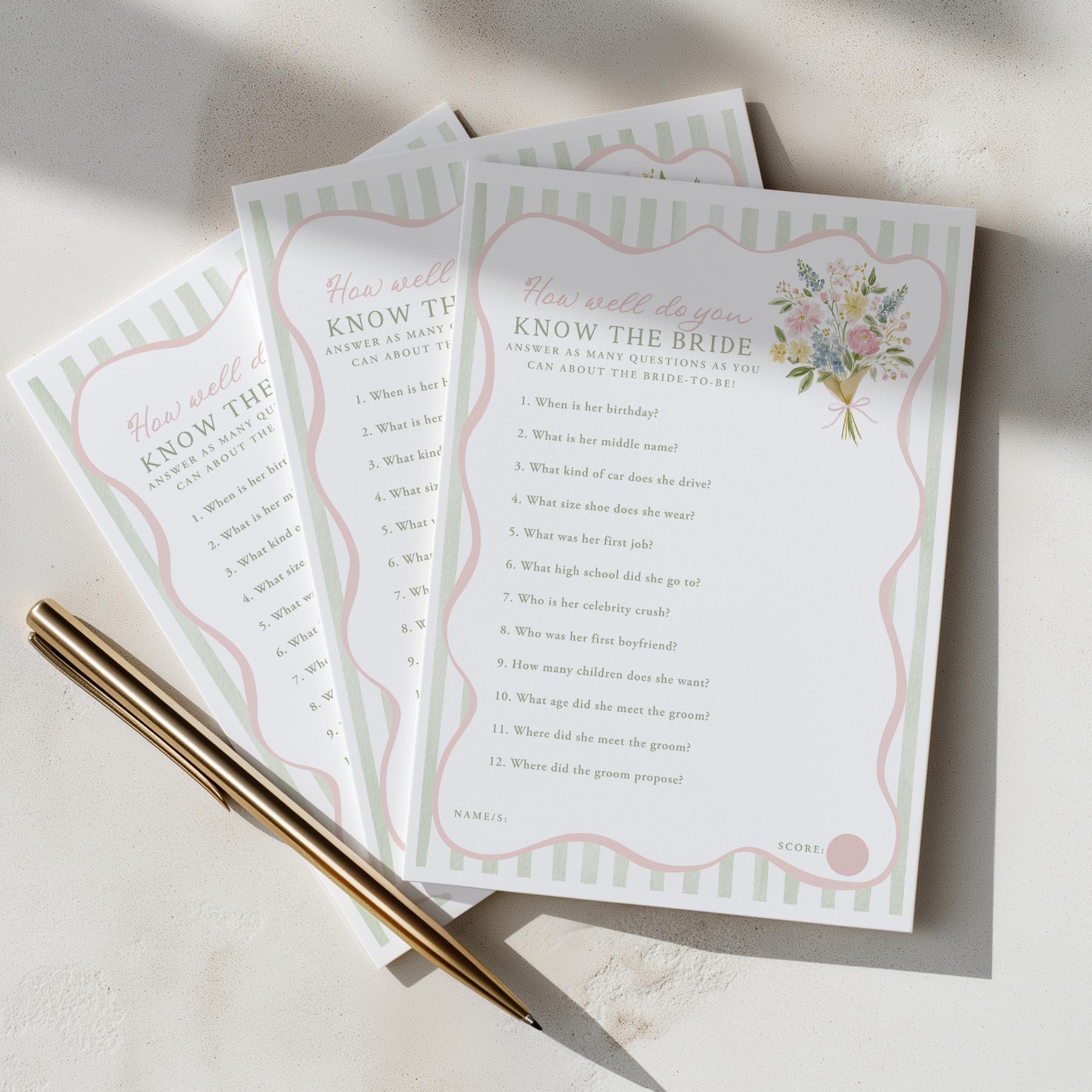 Three 'Do you know the bride?' question cards with a pen on a light surface