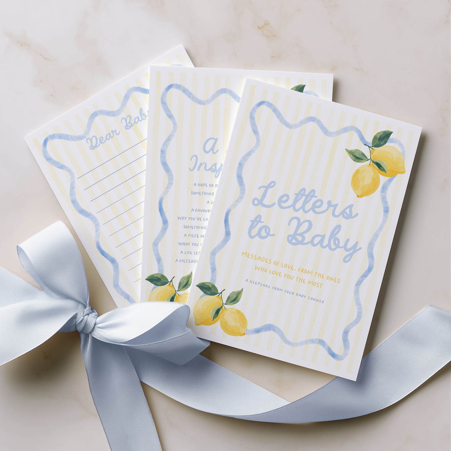 Set of 'Letters to Baby' books with lemon illustrations on a light background
