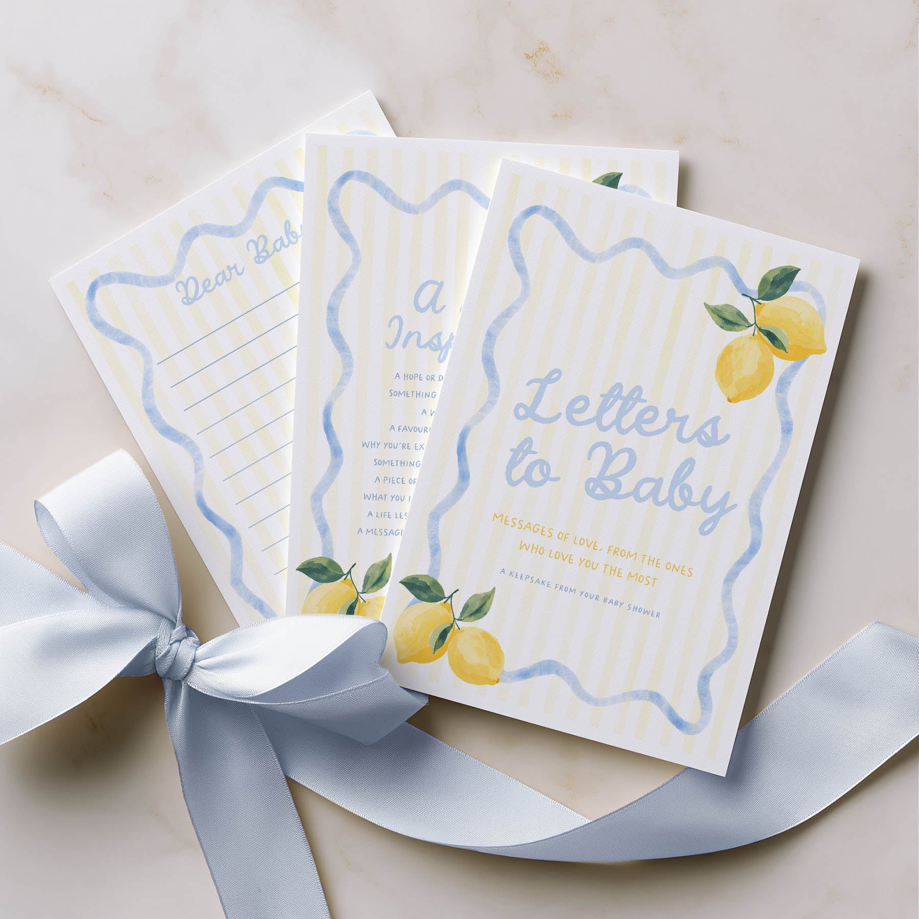 Set of 'Letters to Baby' books with lemon illustrations on a light background