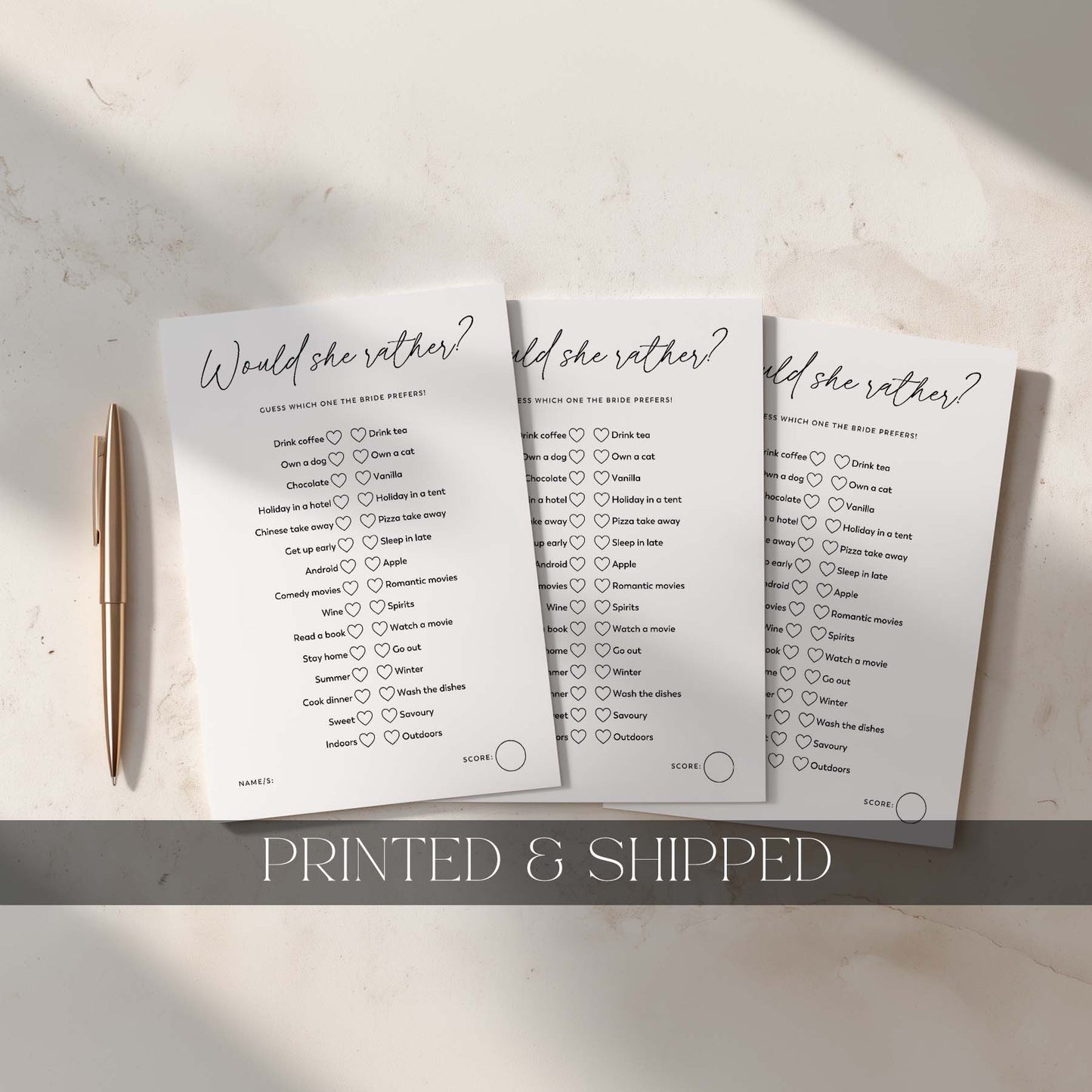 Three printed 'Would she rather?' question sheets on a light surface with a pen.