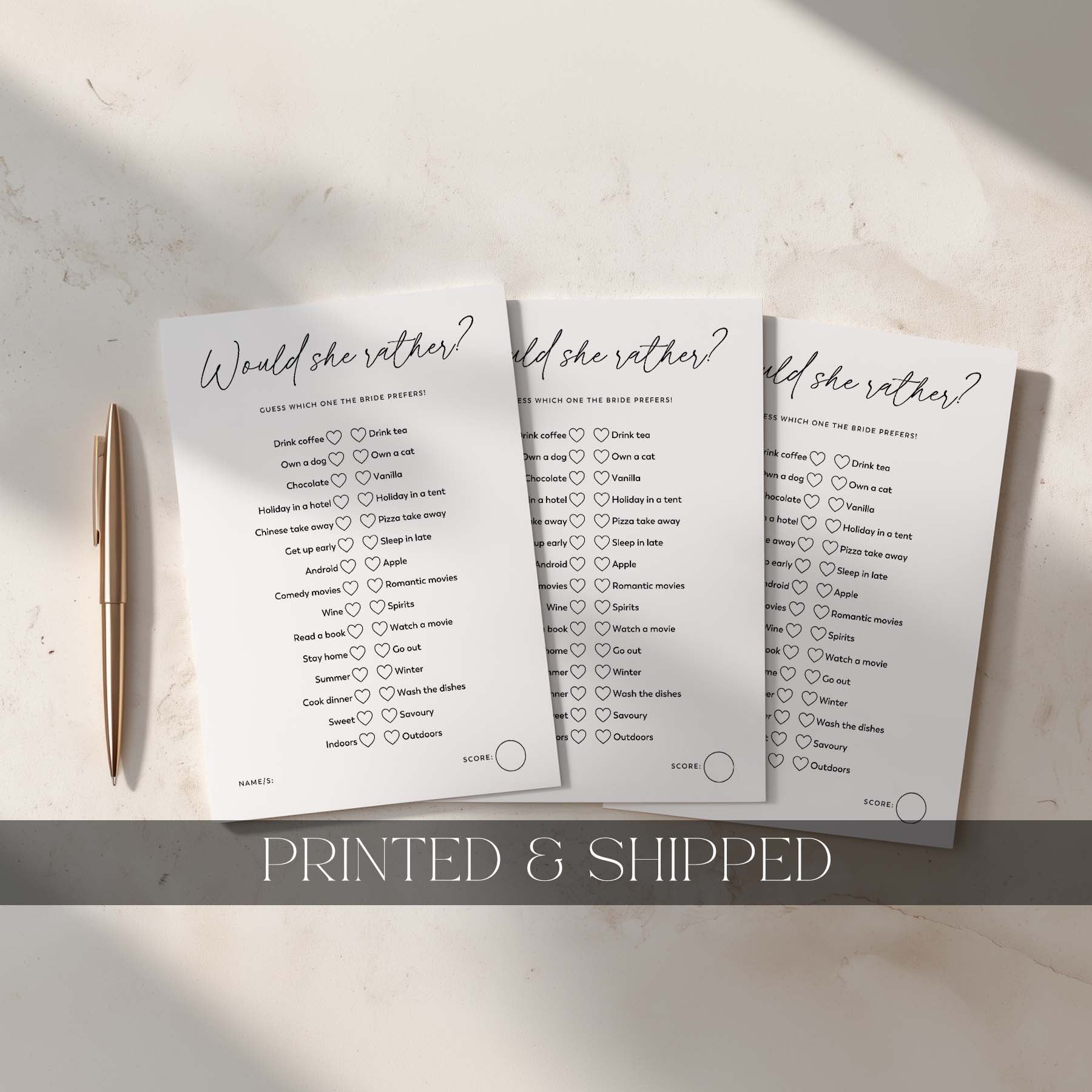 Three printed 'Would she rather?' question sheets on a light surface with a pen.