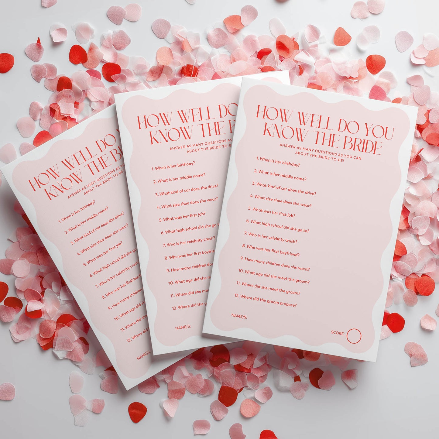 Three 'How Well Do You Know the Bride' question cards on a white background with red and pink confetti.