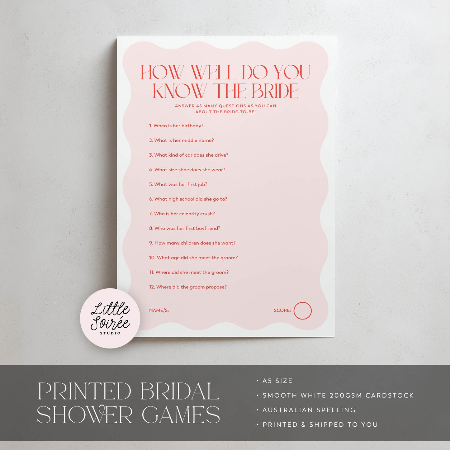 Bridal shower game card with pink and white design on a gray background