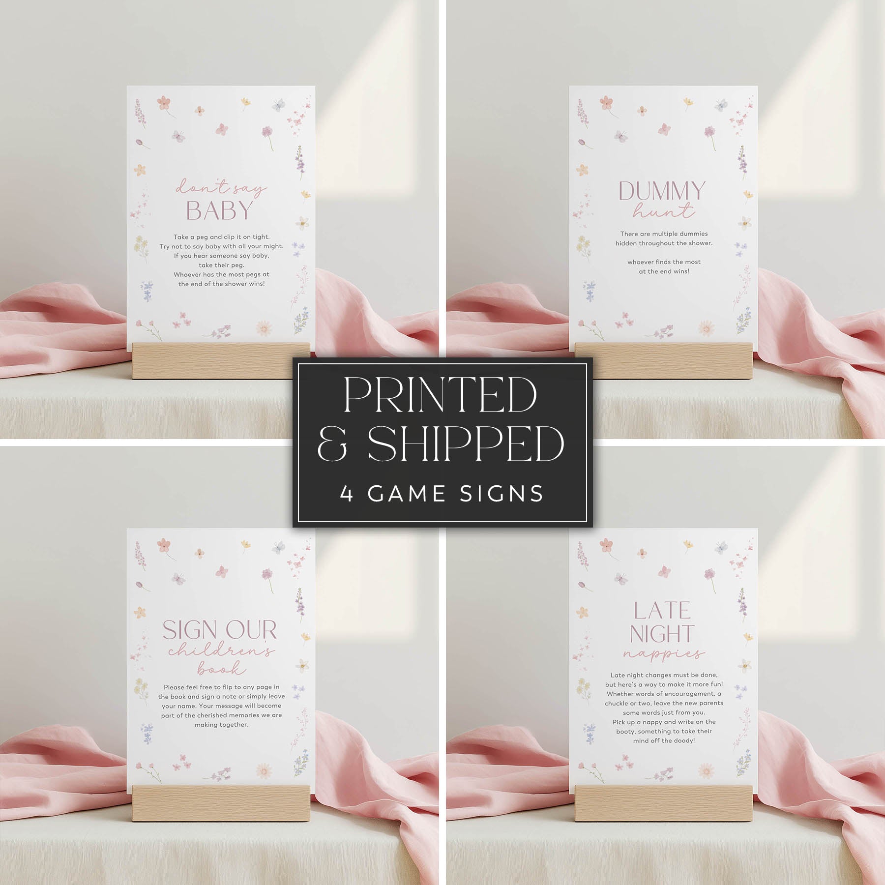Set of four baby shower game signs with pink ribbons on a neutral background