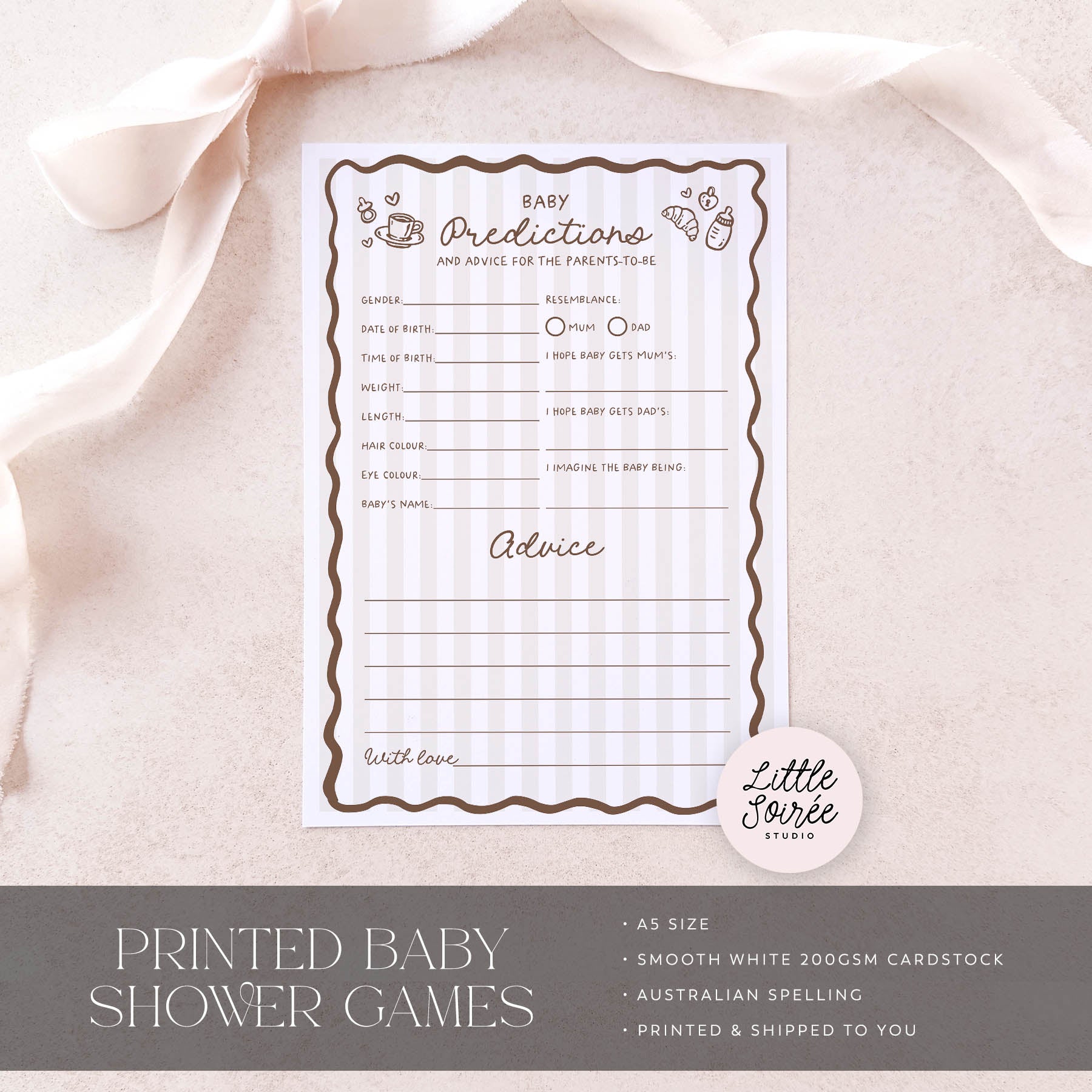 Baby shower game sheet on a baby onesie with 'Little Souris Studio' branding.