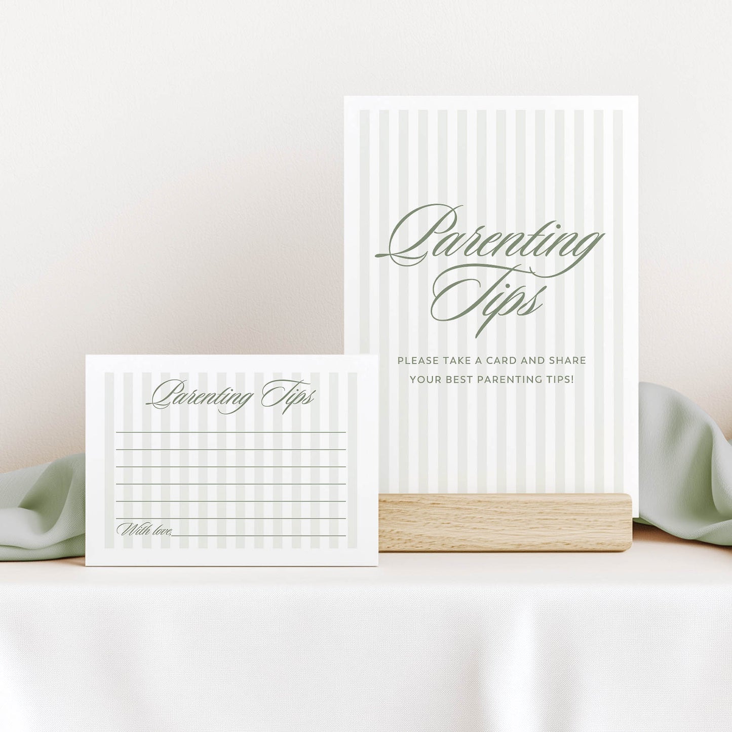 Two white cards with 'Parenting Tips' text on a light surface.