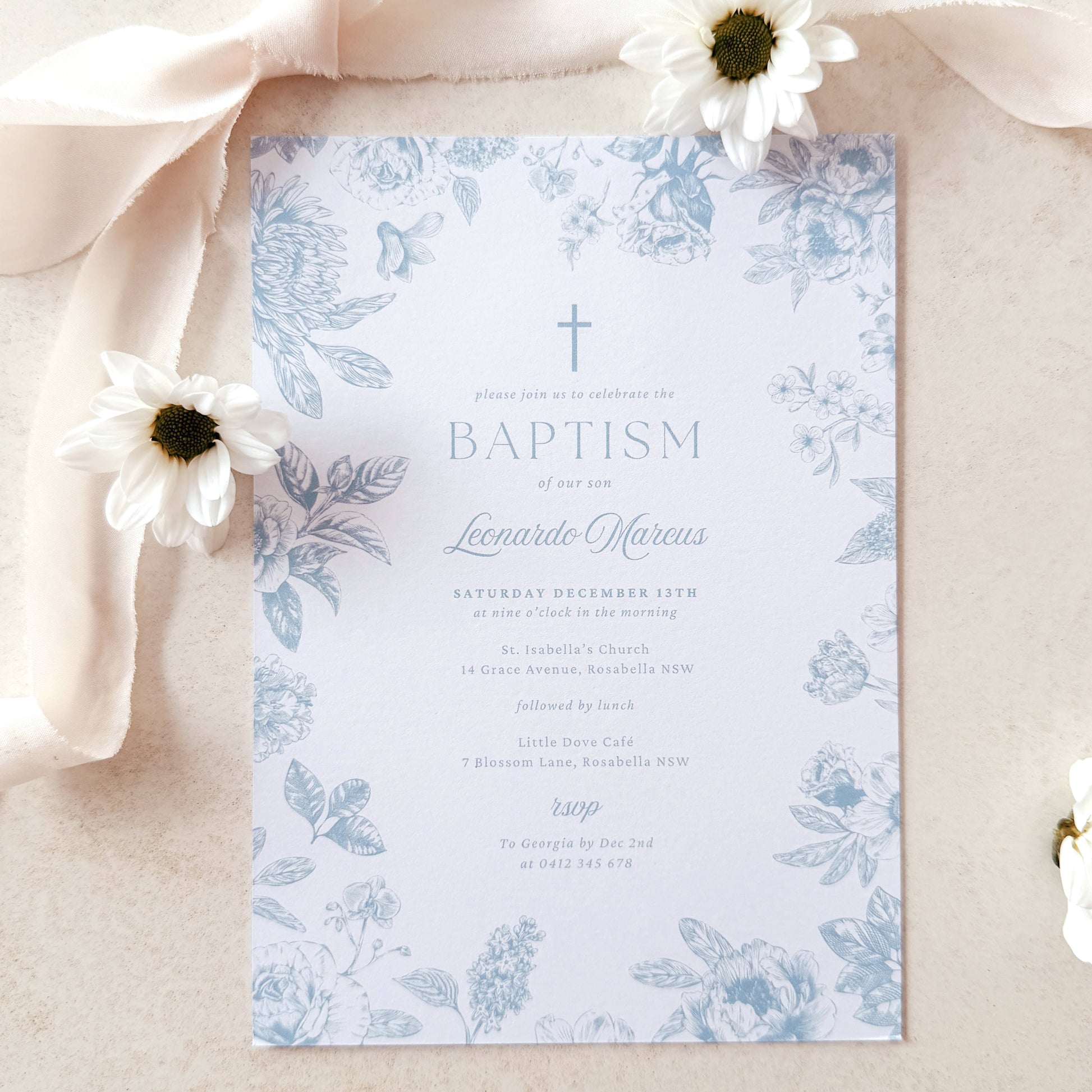 Baptism invitation with floral design on a light background