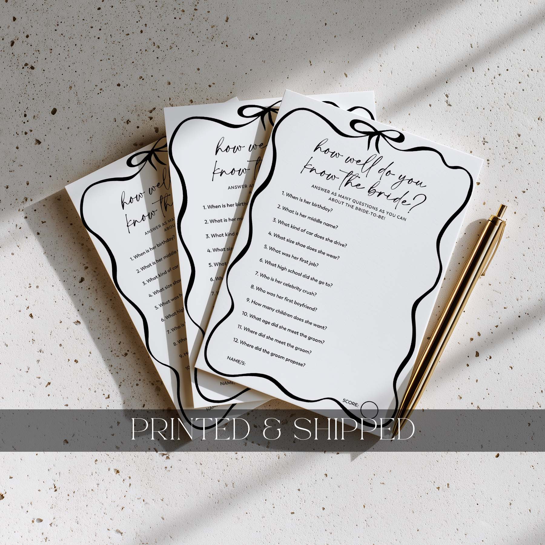 Three printed questionnaires titled 'How well do you know the bride?' on a textured surface with a pen.