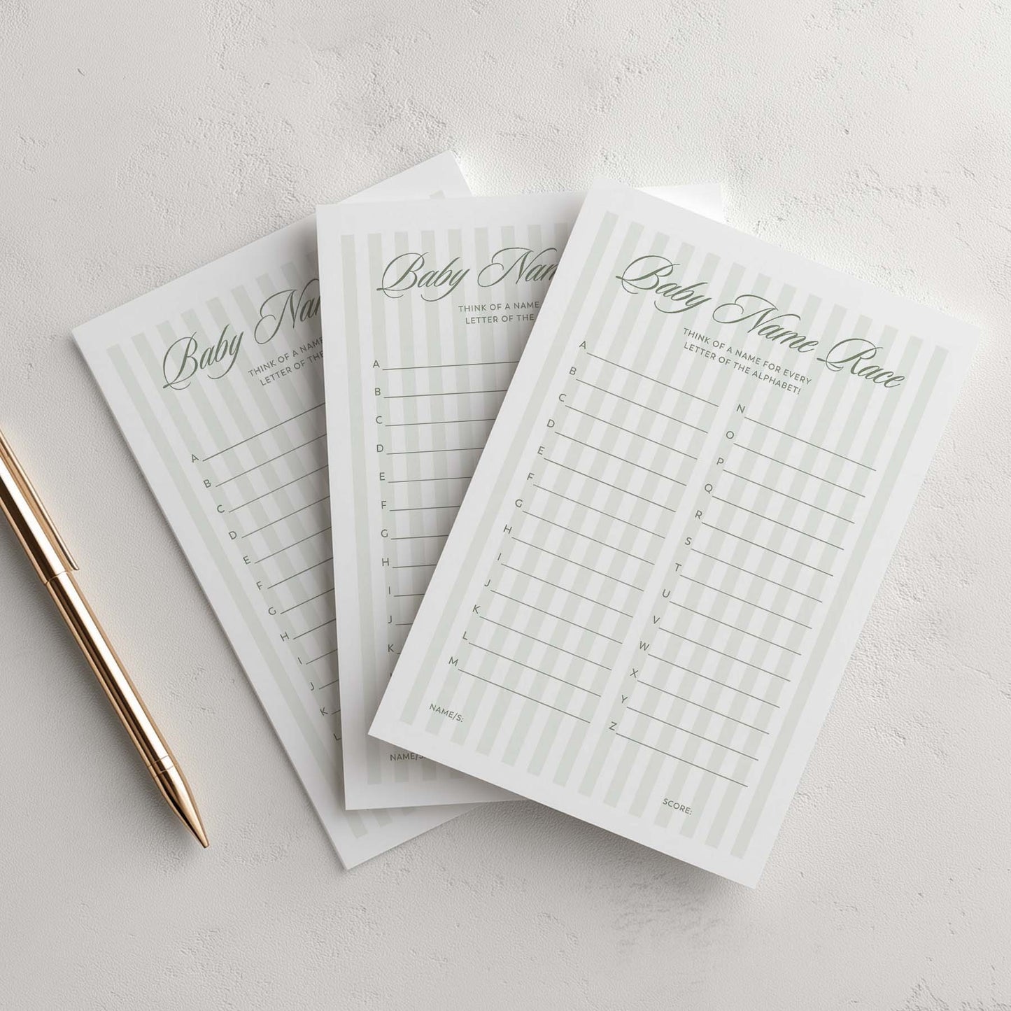 Three sheets of paper with green stripe 'Baby Name Rave' text on a light gray background