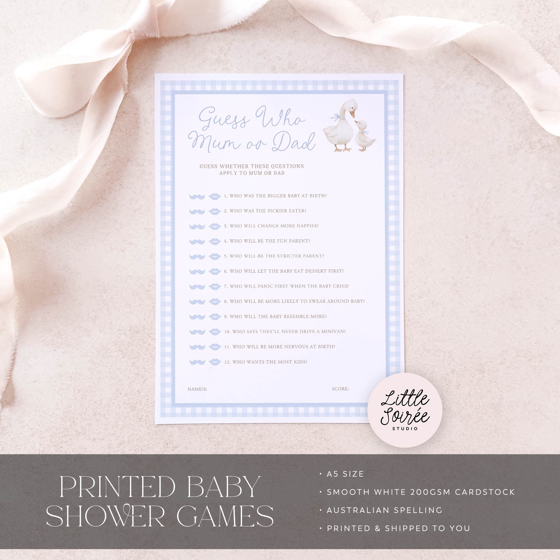 Baby shower game card on a textured surface with 'Little Souris Studio' branding.