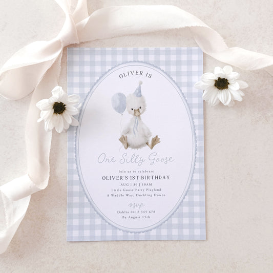 Invitation card with a goose illustration on a checkered background, surrounded by flowers and ribbons.