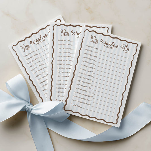 Two sheets of paper with 'Wishes for Baby' text on a beige background with a light blue ribbon.