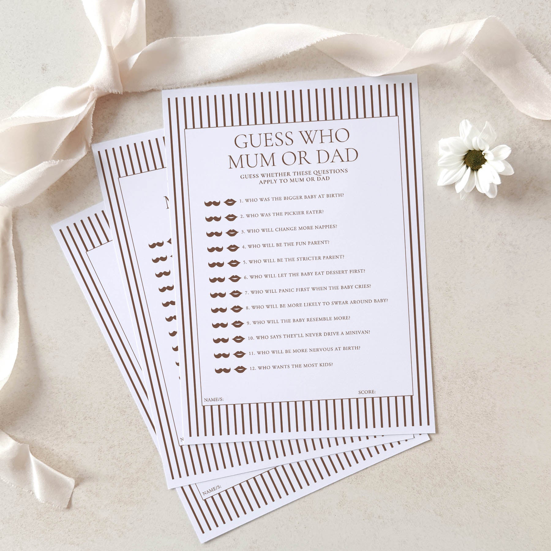 Guess Who Mum or Dad game cards on a light background with ribbons and a flower.