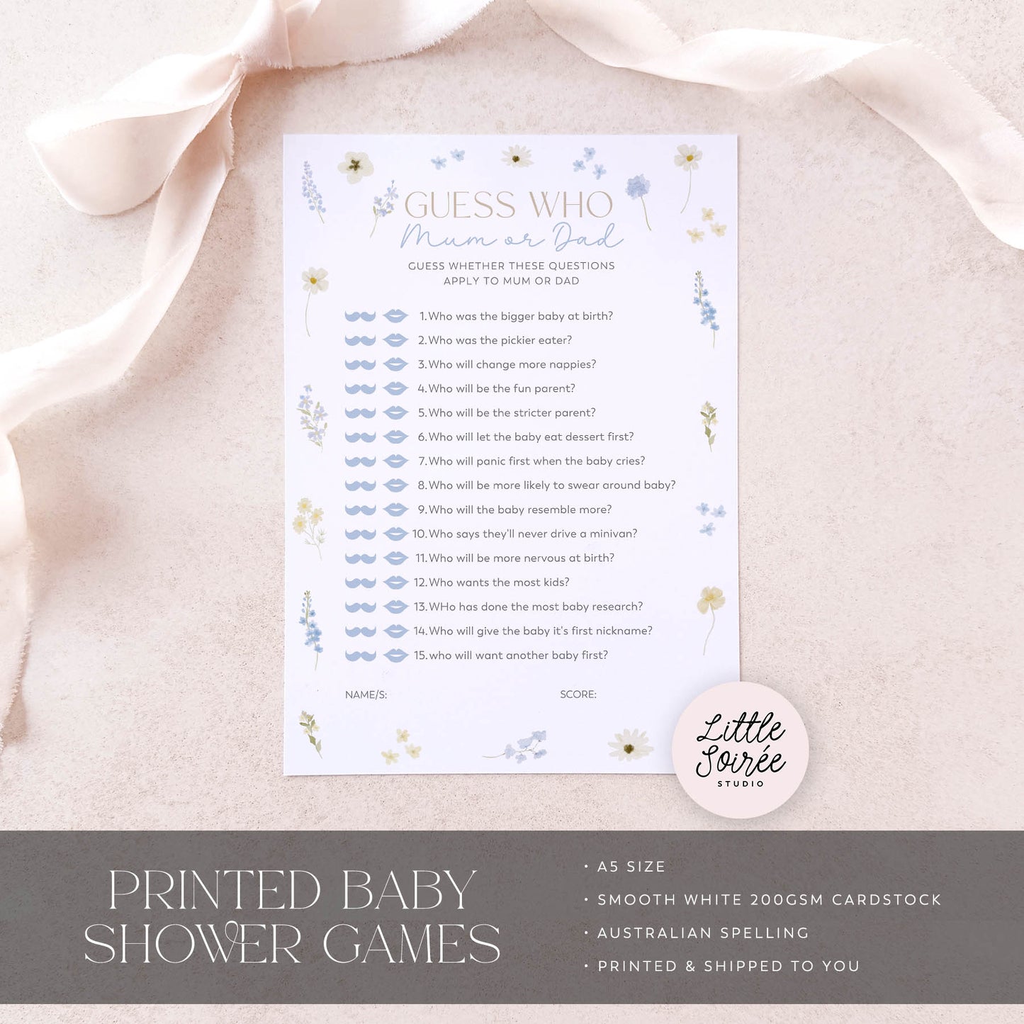 Baby shower game sheet on a pink fabric background with 'Little Souris Studio' branding.