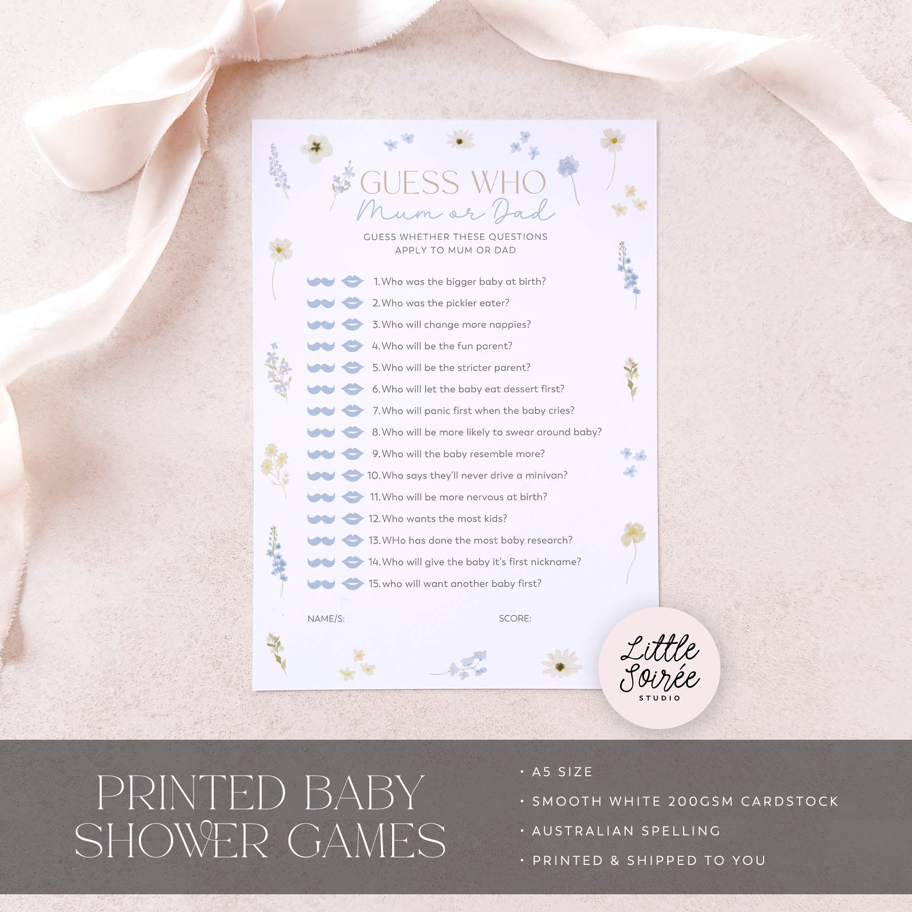 Baby shower game sheet on a pink fabric background with 'Little Souris Studio' branding.