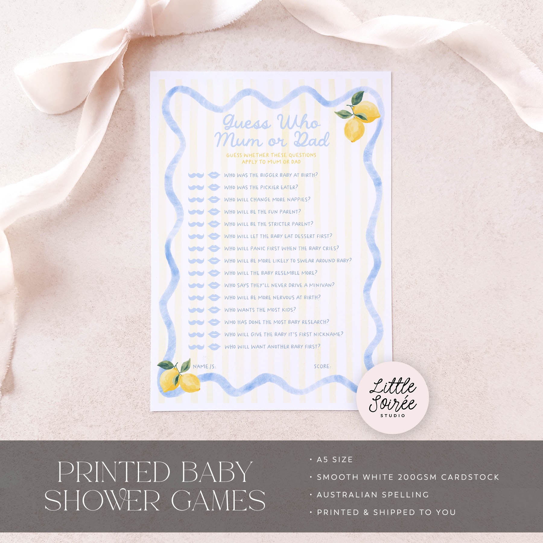 Baby shower game card on a light pink fabric background with 'Little Sourie Studio' branding.