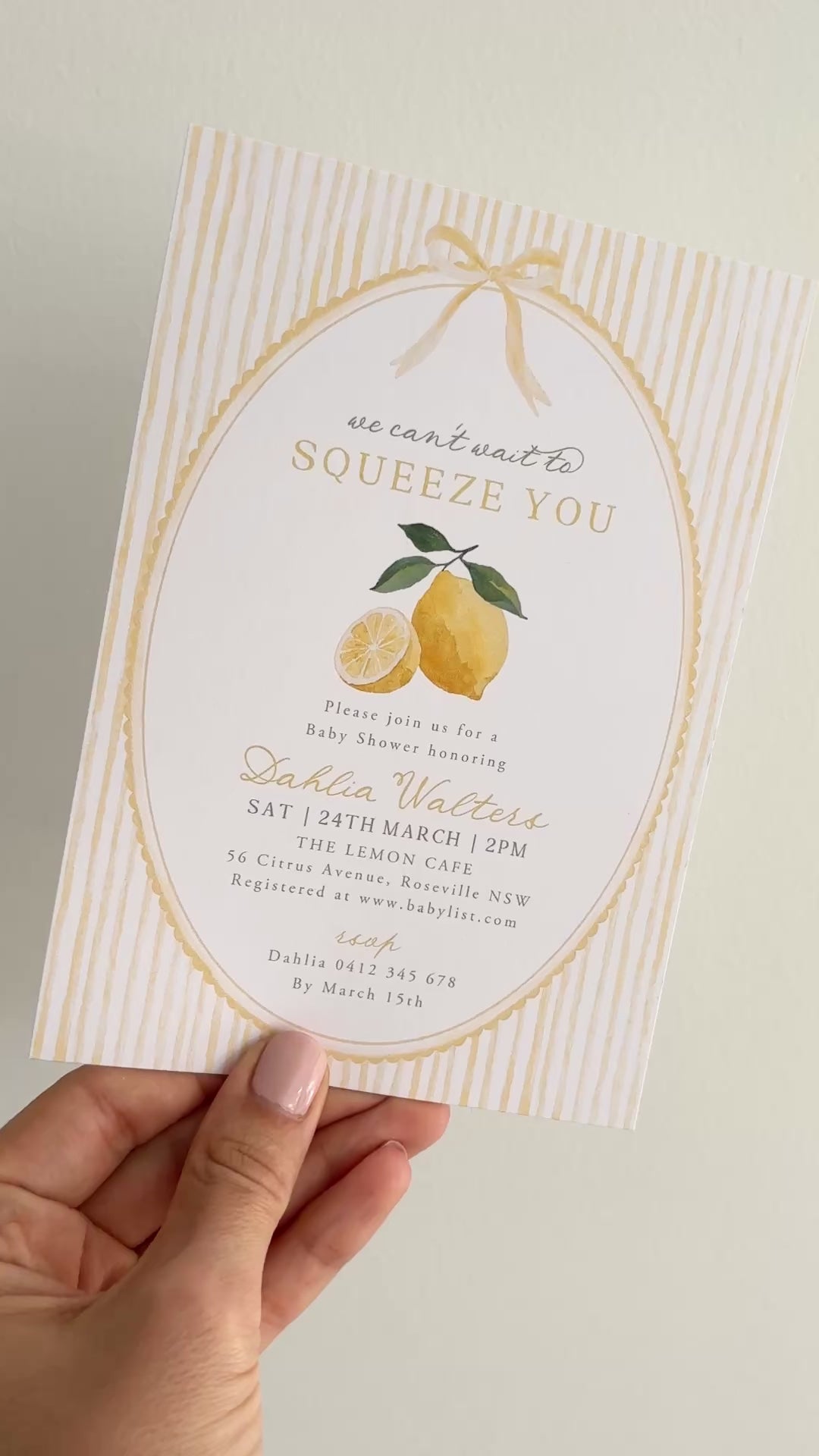 We can't wait to squeeze you baby shower invitation with lemons and yellow striped background with decorative fonts. 