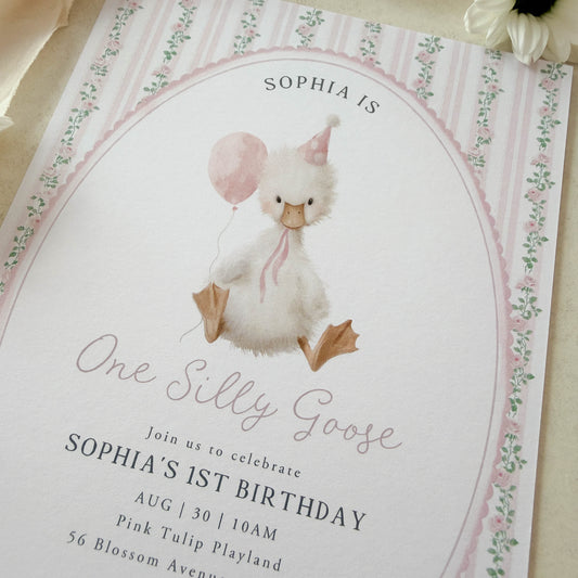 Invitation card with a goose illustration and birthday details on a floral background