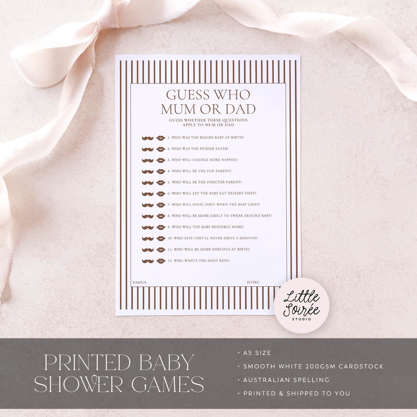 Baby shower game card on a soft pink fabric background with 'Little Souris Studio' branding.