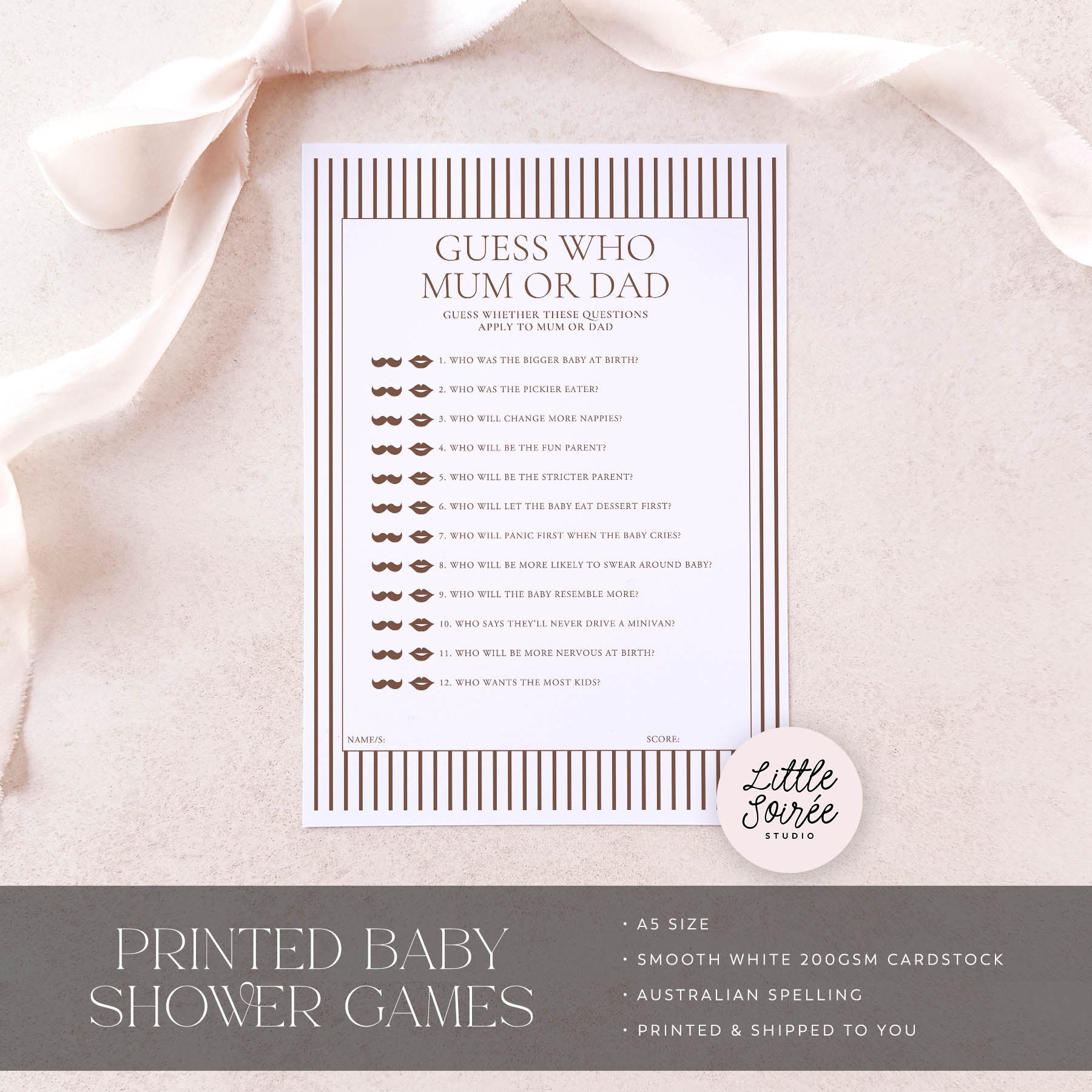 Baby shower game card on a soft pink fabric background with 'Little Souris Studio' branding.