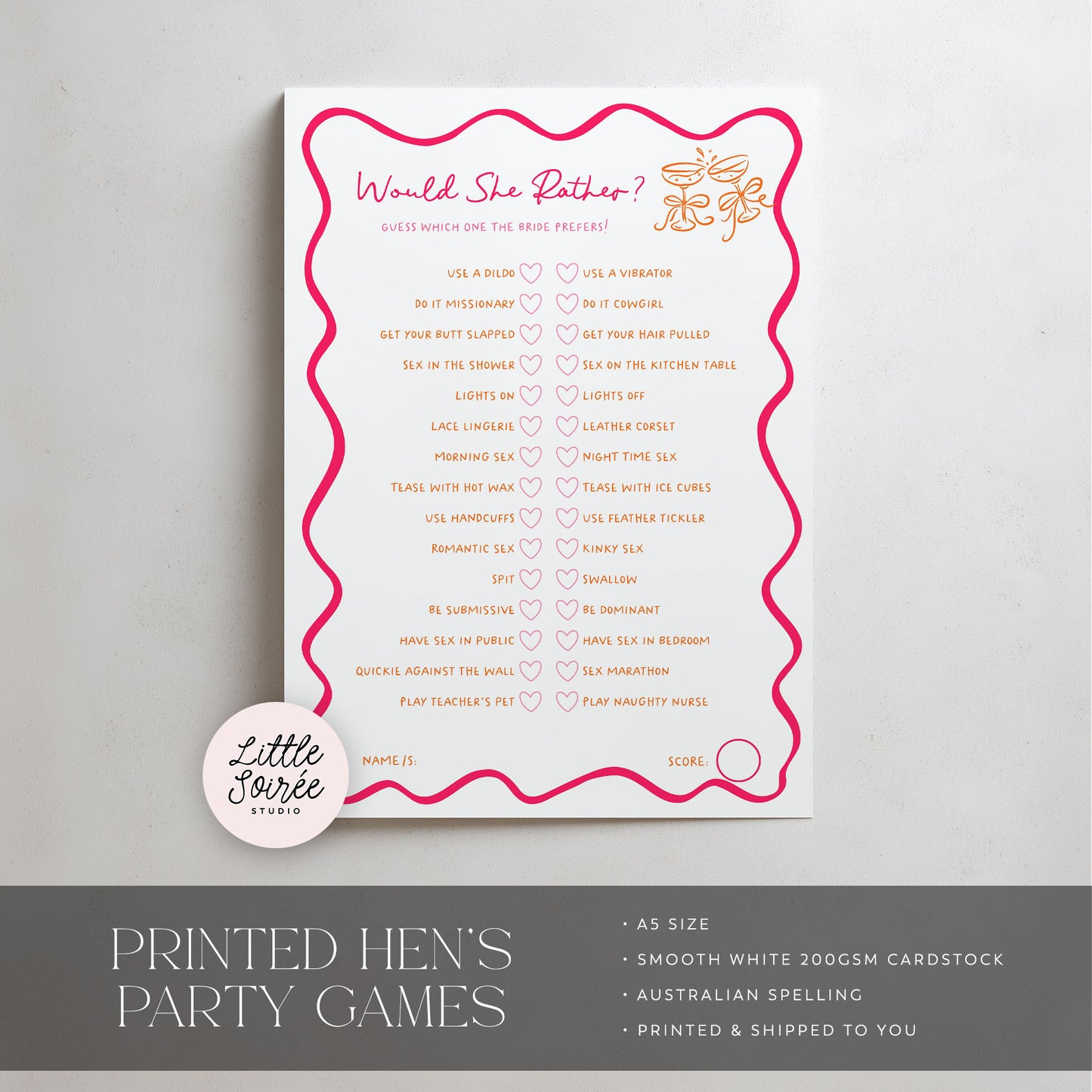 A printed party game card titled "Would She Rather?" with a pink wavy border, listed words in peach text, and small heart icons, shown on a light background. A round sticker reading "Little Soiree Studio" appears near the lower left, and a dark gray banner at the bottom advertises printed hen's party games.