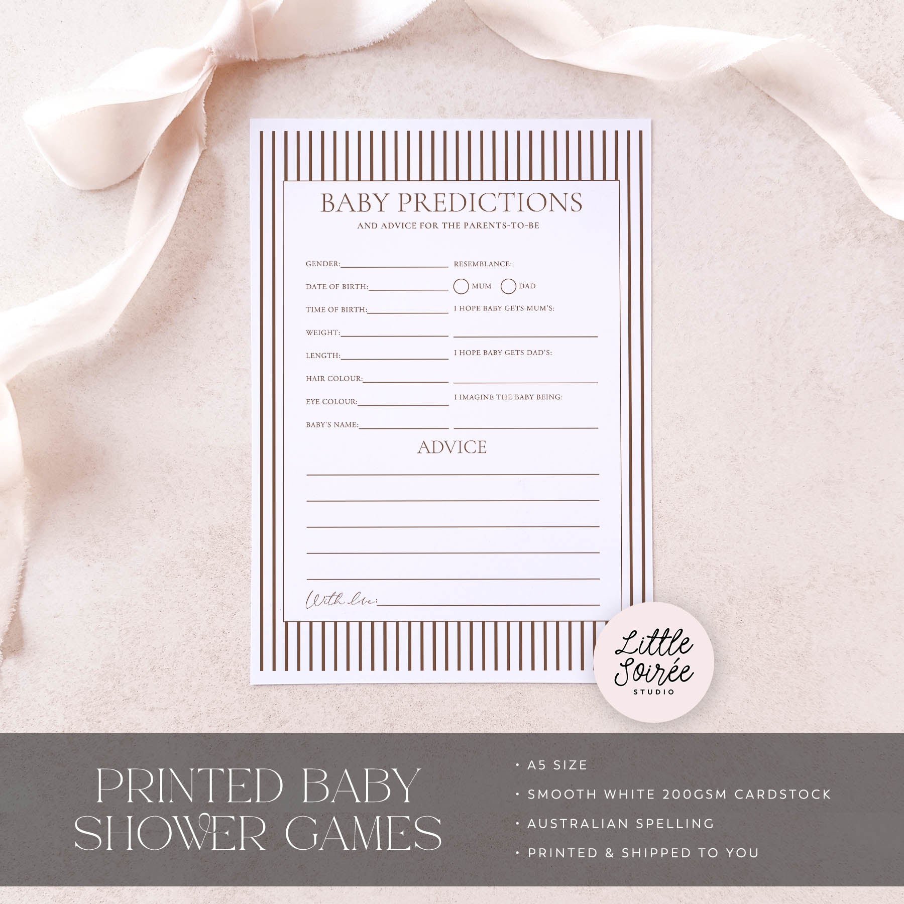 Baby shower game card on a soft pink fabric background with 'Little Souris Studio' branding.